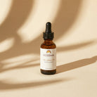 KOSSMA tallow beauty oil bottle on a beige background